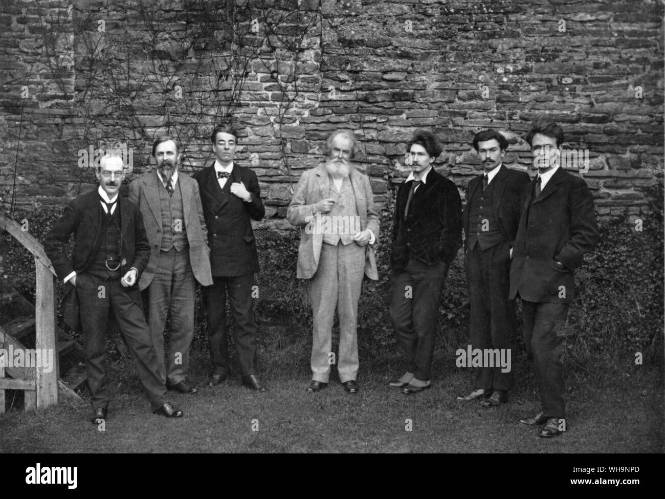 The Guests at a house party at the home of W S Blunt in 1914 left to right Victor Plarr, Sturge moore, W B Yeats, Wilfred Scawen Blunt, Ezra pound, Richard Aldington and F S Flint Stock Photo