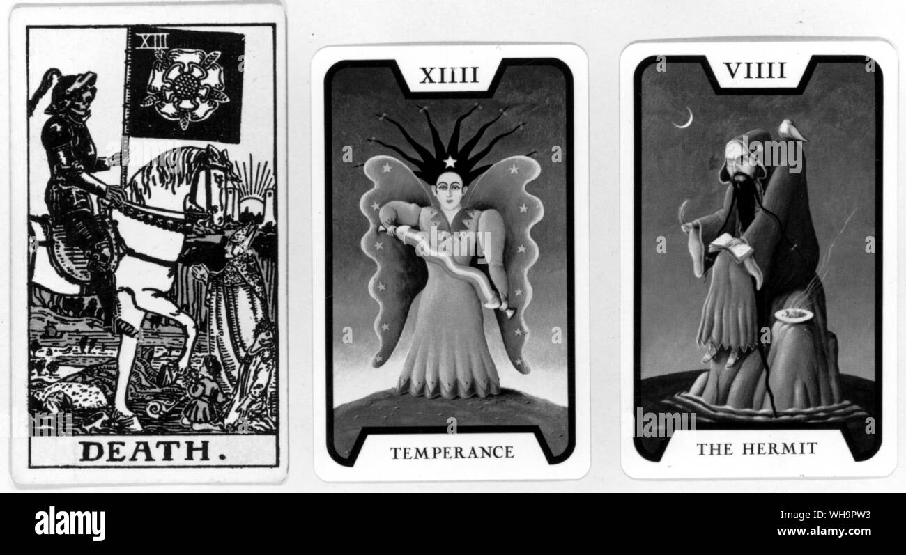 Tarot cards - The Hermit - The solitary hunchback of the 007 pack (far right), and Temperance a card of the 20th centuiry in which an angel holds a rainbow Stock Photo