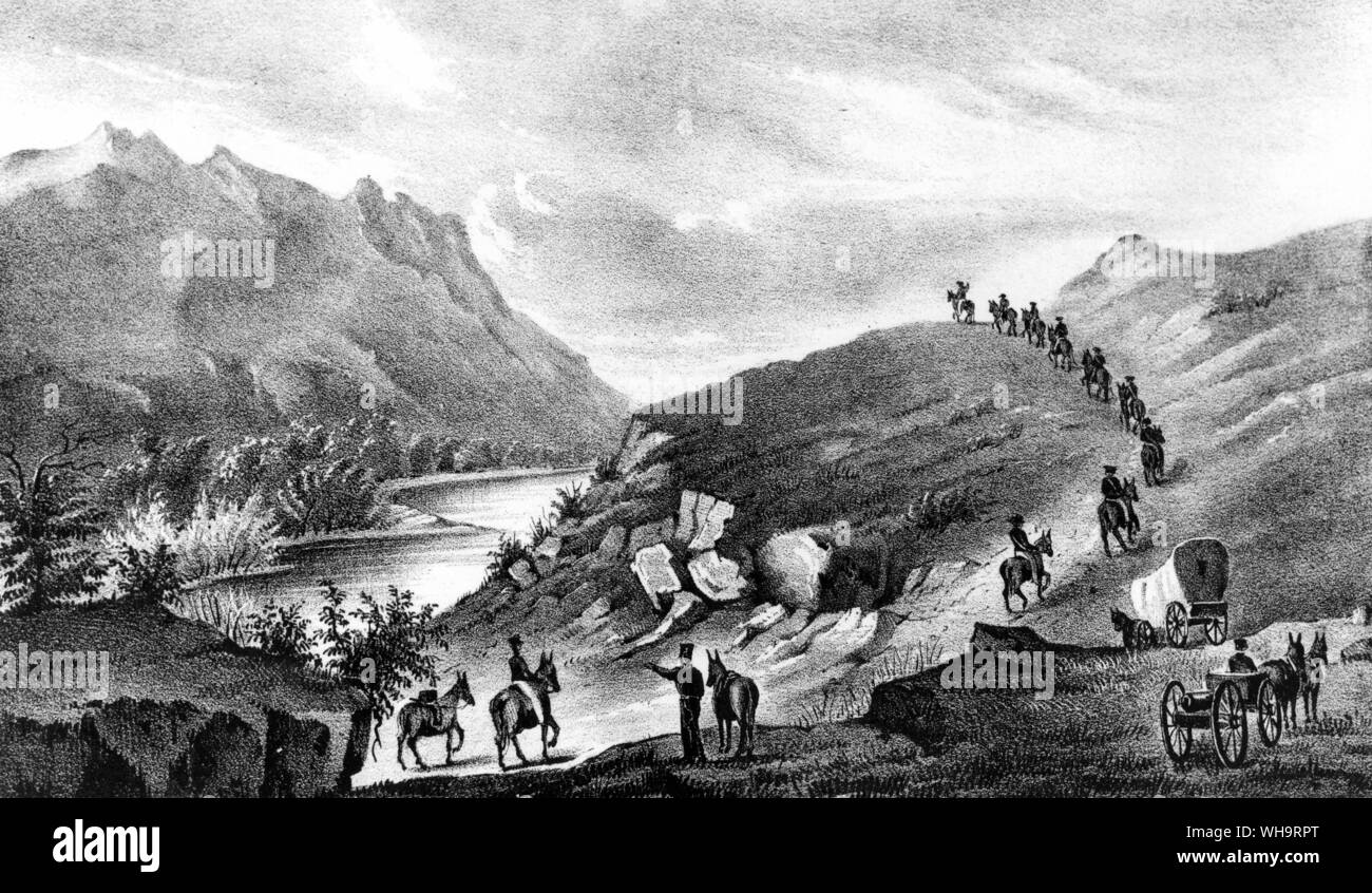 Mexico: Wagons on the Sante Fe trail with mountains the rest of the way, 1846-47. Stock Photo