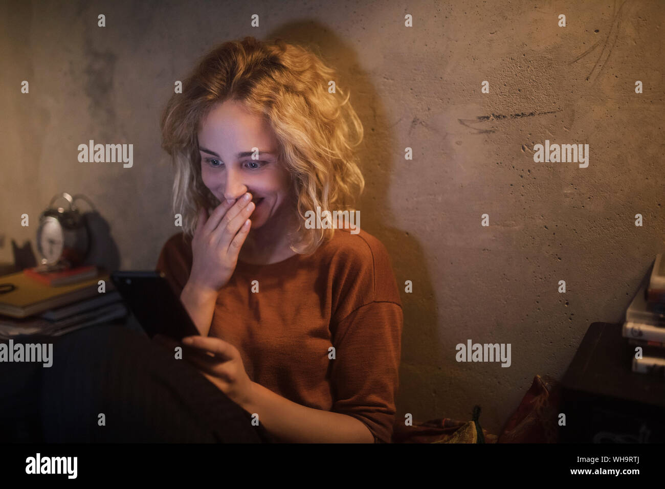 Surprised blond woman looking down hi-res stock photography and images ...