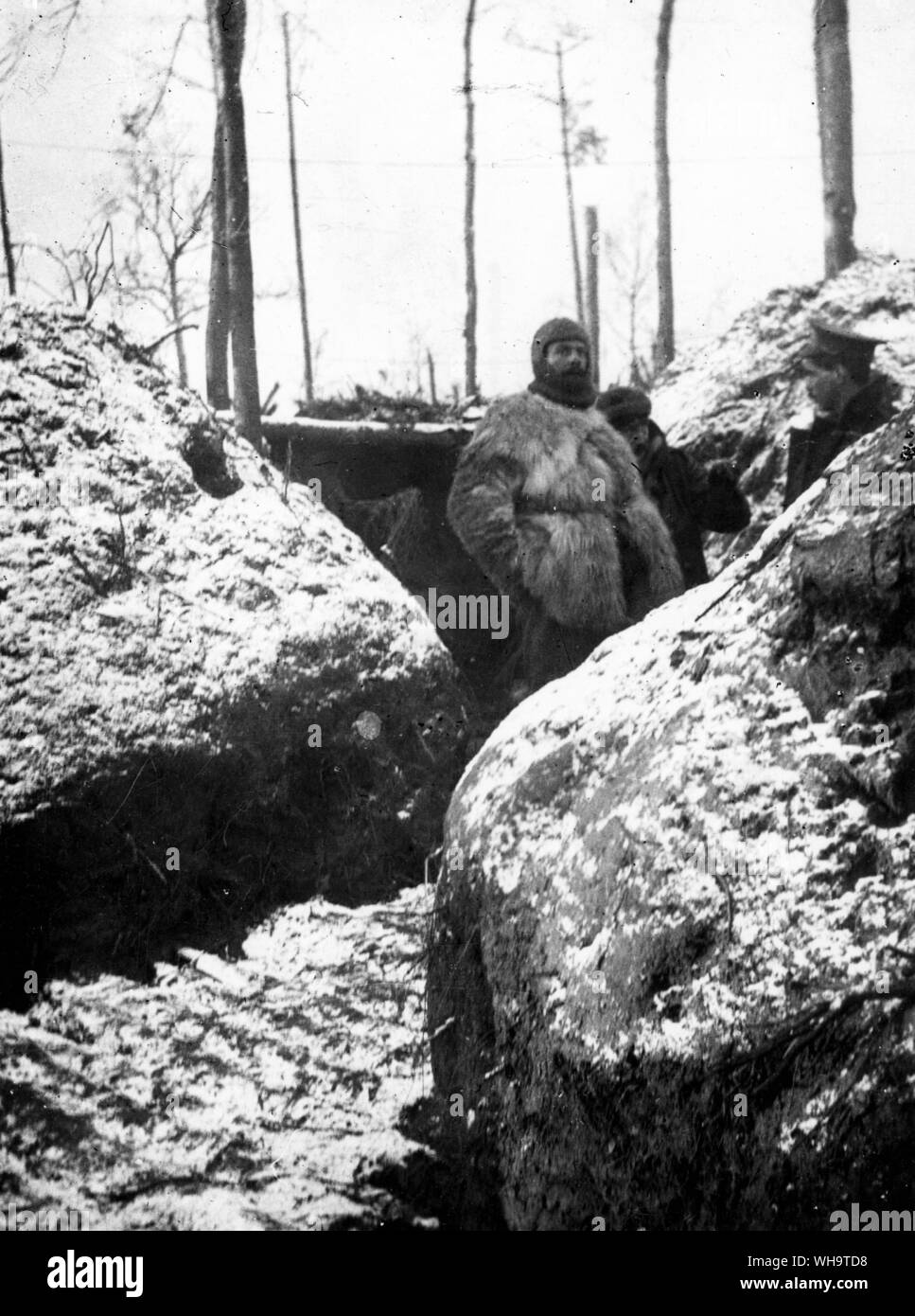 WW1: Northern France: XI Hussars in trenches at Zillebeke, Jan/Feb. 1915. The weather was bitterly cold but hardly a man went sick (!). Corporal Peel of the M G section 11th Hussars 1930 Regimental Sergeant-Major. Stock Photo