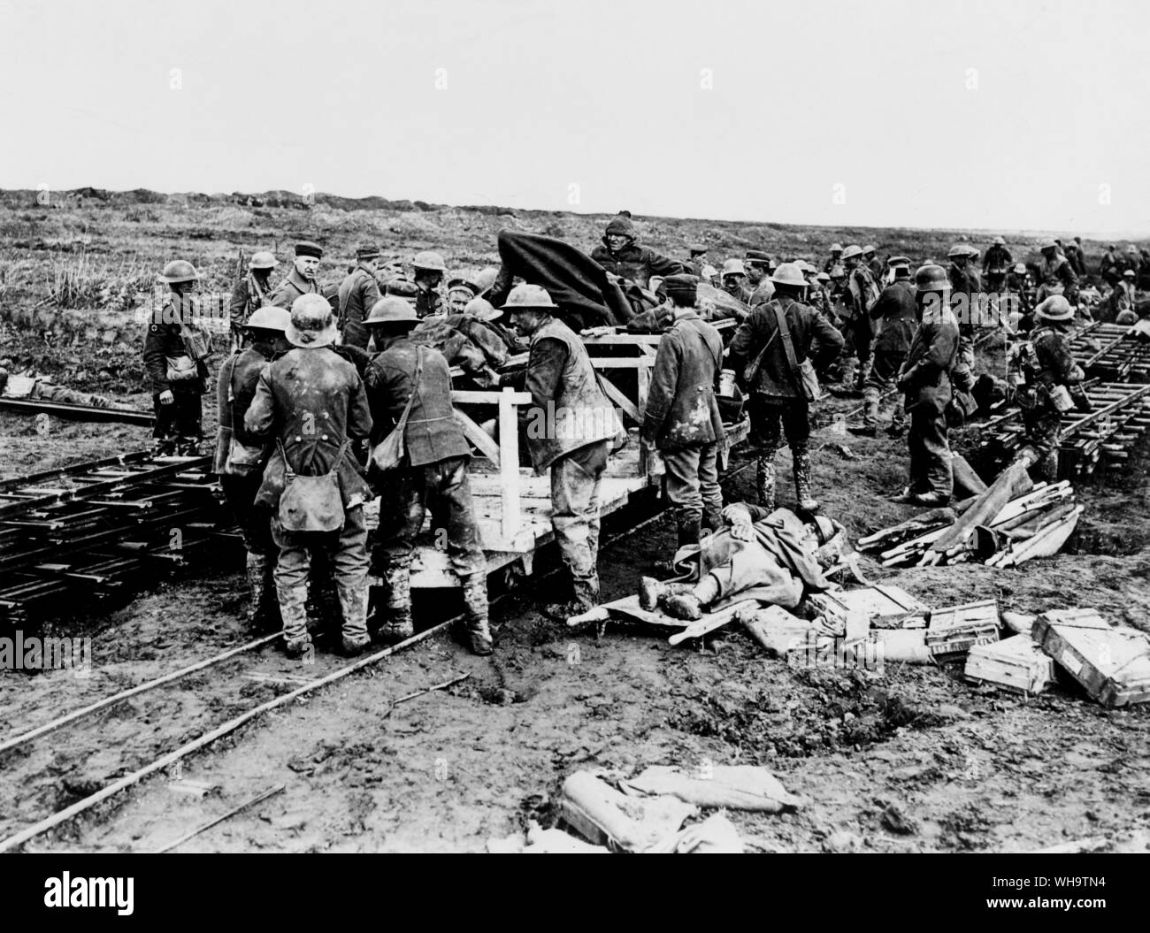 WW1/France: Battle of Vimy Ridge. Canadian and German Red Cross men despatching wounded to a dressing station on a light railway. April 1917. Stock Photo