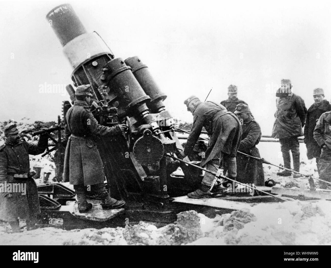 WW1/ The Balkans. Austrian artillerymen preparing a 305mm mortar gun for action. Carpathians, 1914. Stock Photo