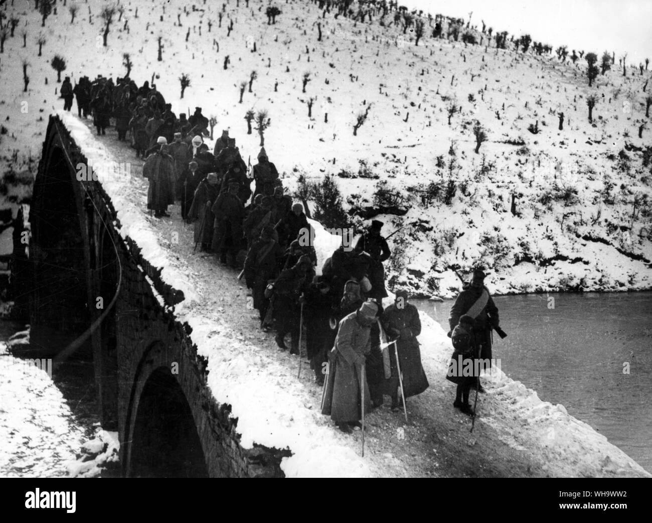 WW1/ The Balkans. Serbian headquarters staff crossing the bridge in Albania. October 1915. Stock Photo
