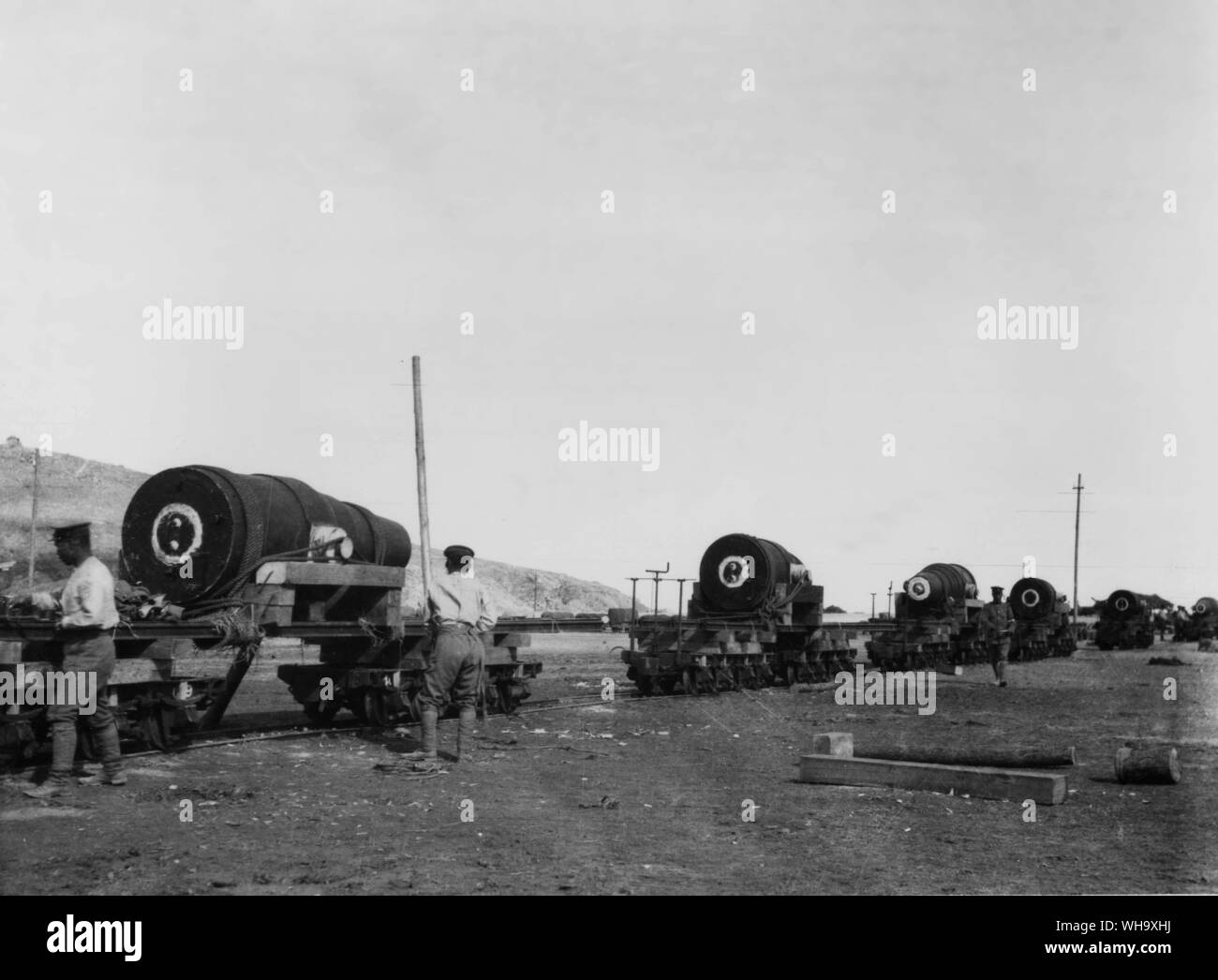 WW1: China Operations. Japanese 11-inch howitzer guns on railway trucks ...
