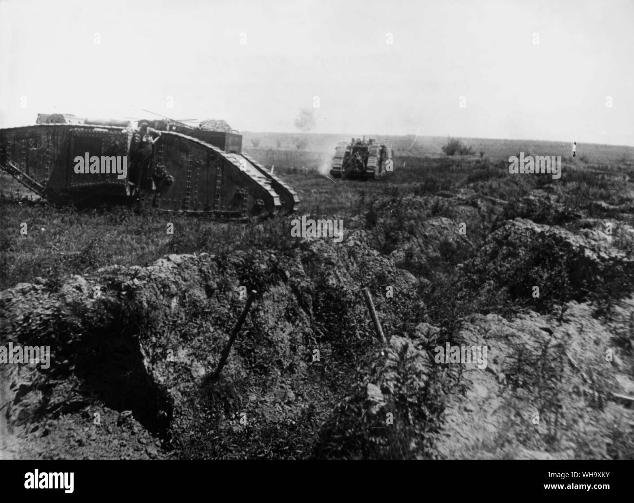 WW1: Battle of Hessines. Mark II supply tank and Mark IV female tank on its way into action during attack on Western Ridge. 7th June 1917. Stock Photo