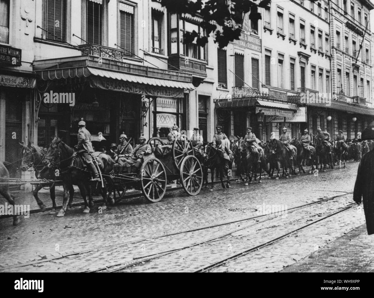 WW1: German occupation of Brussels, Belgium. German artillery passing through the streets, 26th Aug. 1914. Stock Photo
