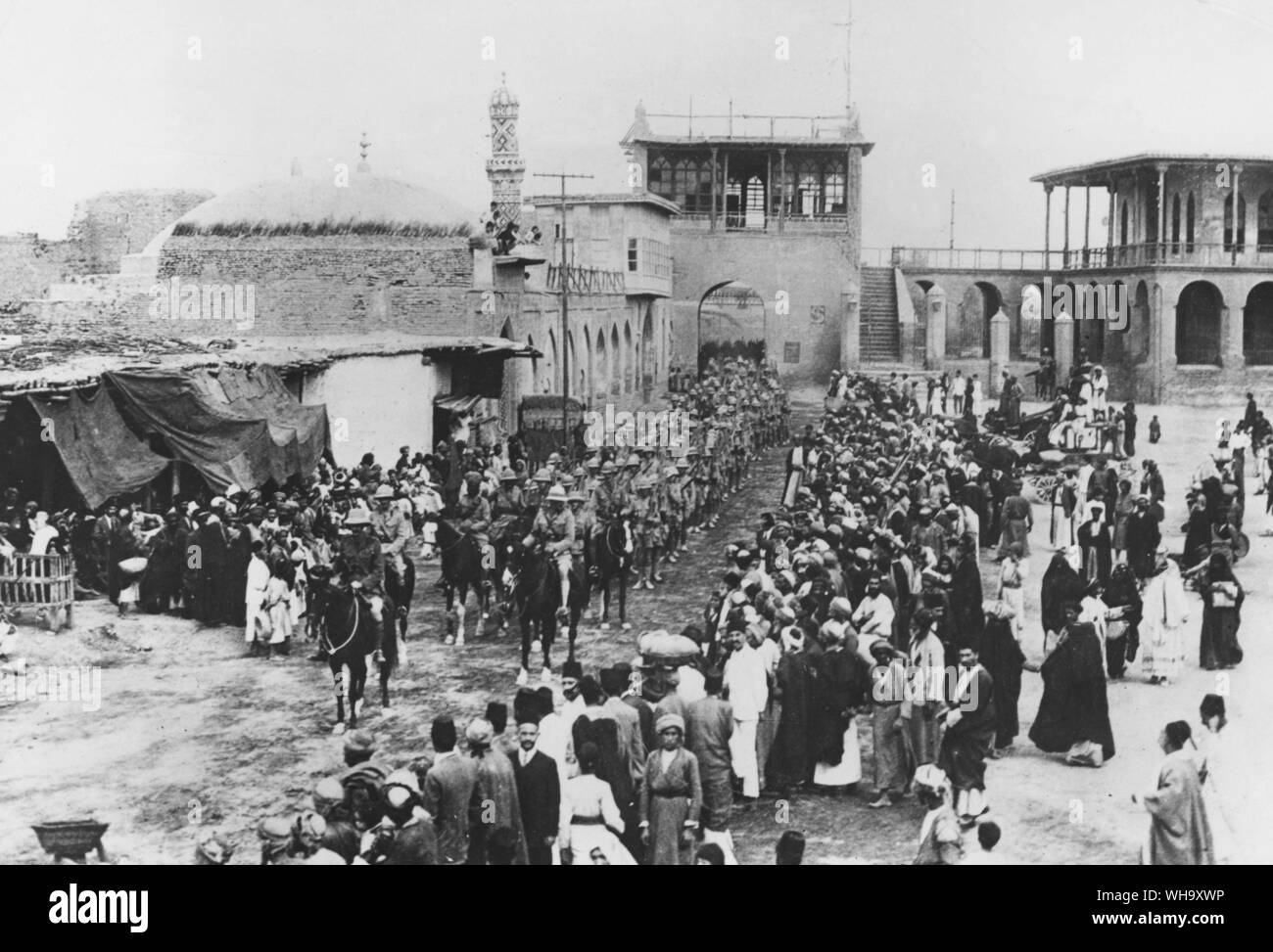 WW1: Allied troops entering Baghdad, the City of the Caliphs on March 11th 1917. Stock Photo