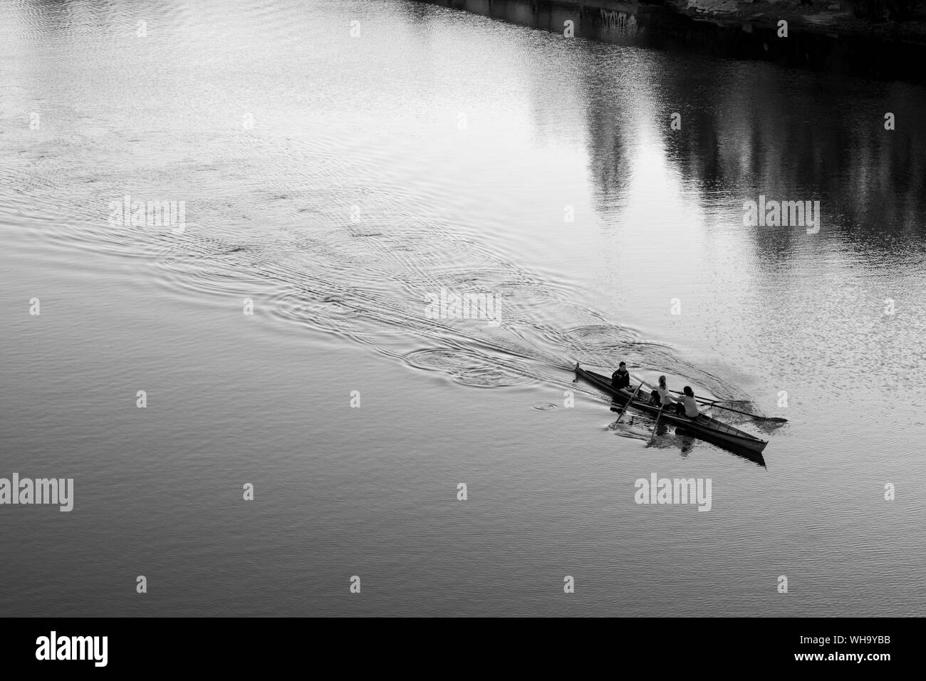 Men in rowing boat Black and White Stock Photos & Images - Alamy