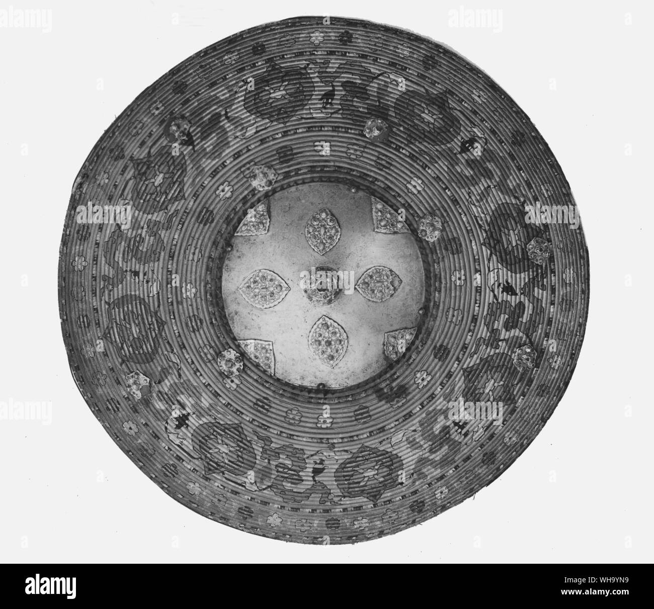 Turkish shield of cane covered with silk and with steel boss, 17th century. Stock Photo