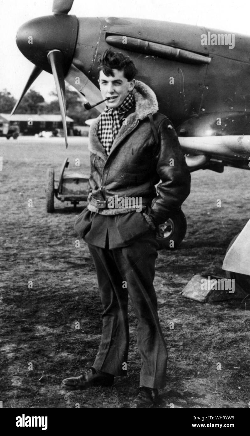 WW2/Battle of Britain: RAF pilot smokes a pipe on airfield. Stock Photo