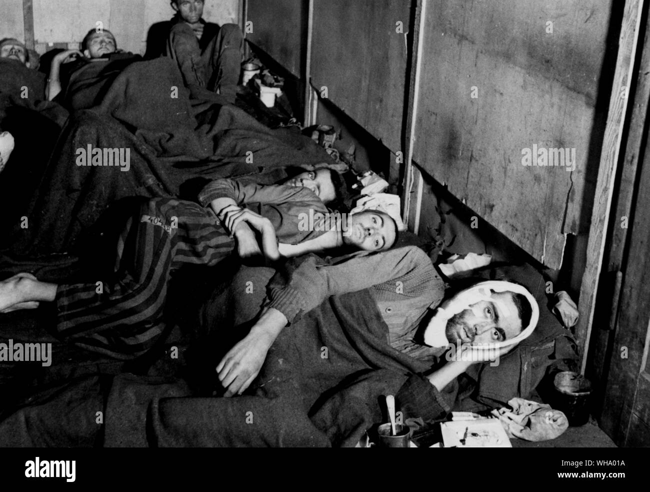 WW2: French political prisoners lying on the floor. Stock Photo