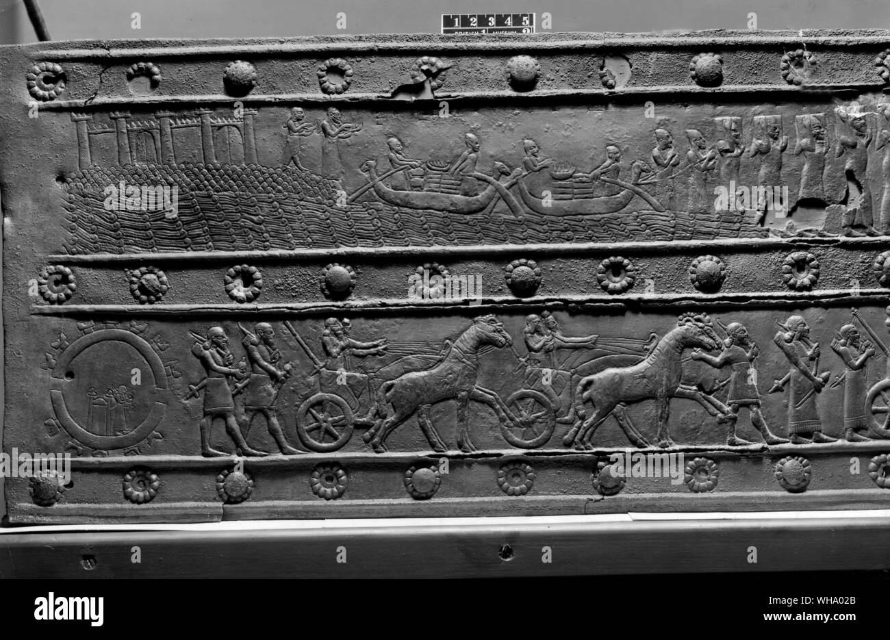 Assyrian art: Detail from bronze doors of Balawat (upper panel). Phoenician boat brings tribute from Tyre. Stock Photo