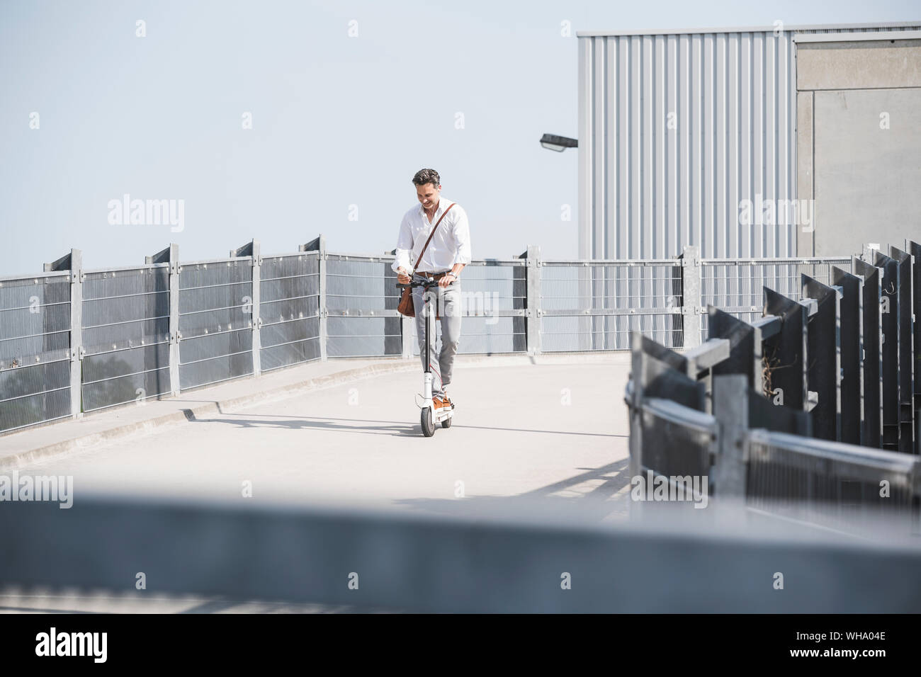 Man riding e scooter germany hi-res stock photography and images - Alamy