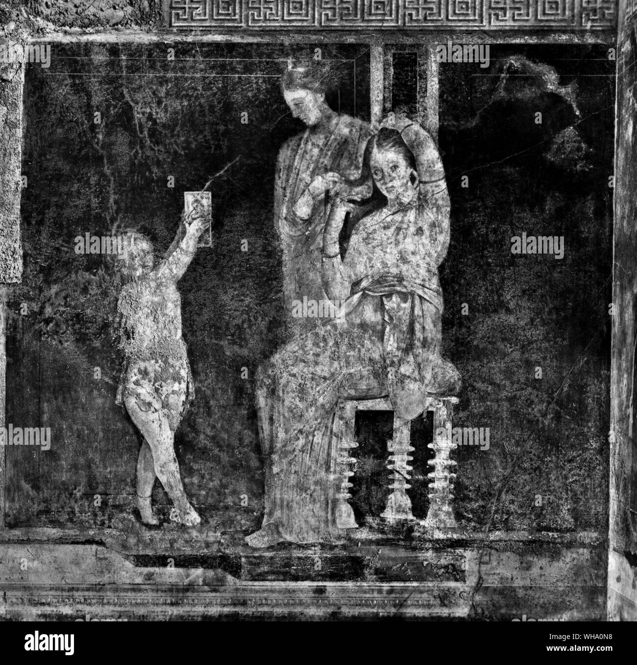 Initiates into the Dionysian mysteries. A fresco from the Villa dei Misteri at Pompeii ('Love and her servant''Love and her servant'). Stock Photo