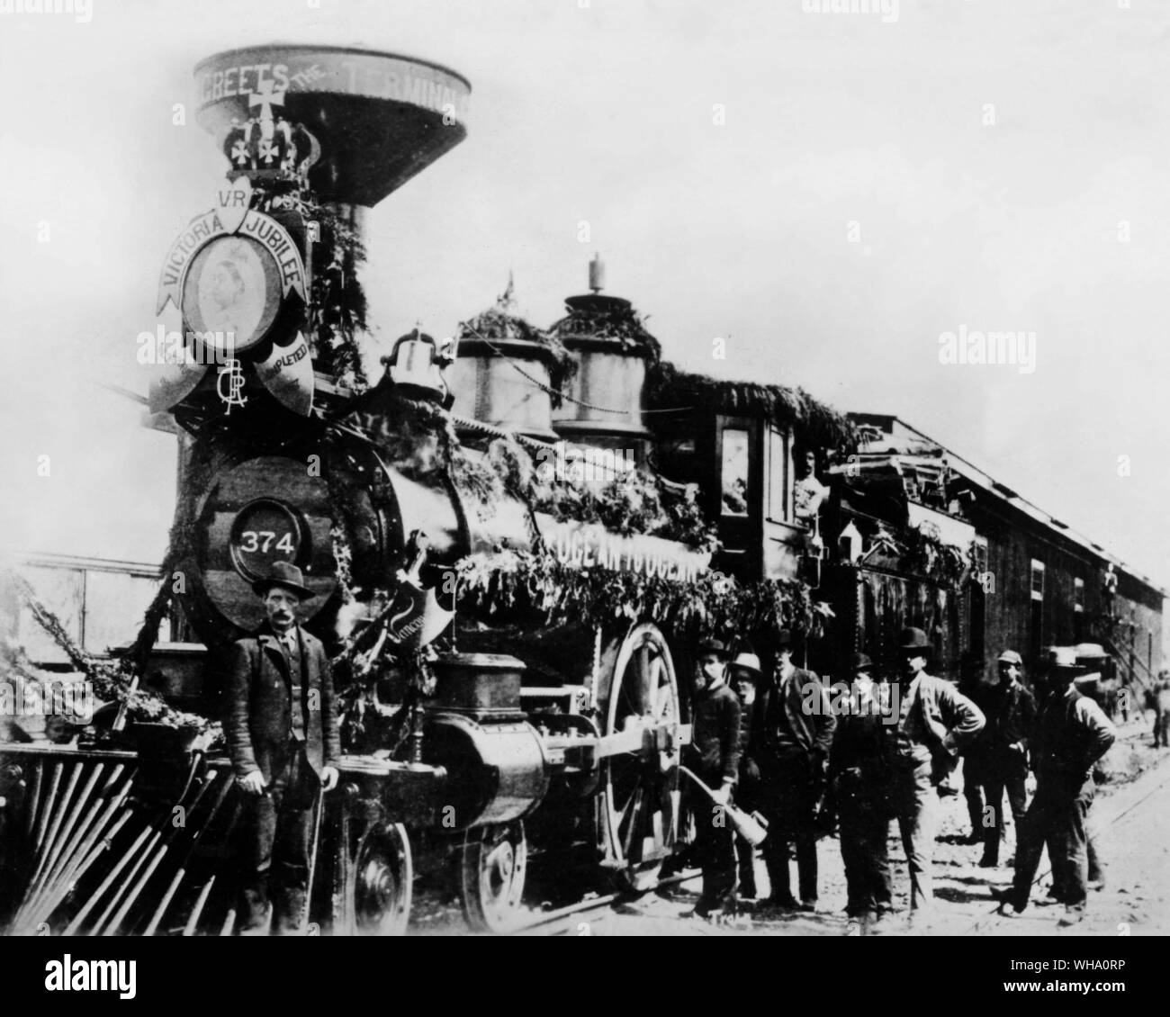 An early Canadian Pacific train arrives at Port Moody, 1887. Queen Victoria's Jubillee Year. It was in thi syear tha the line was extended from Port Moody to Vancouver. Stock Photo