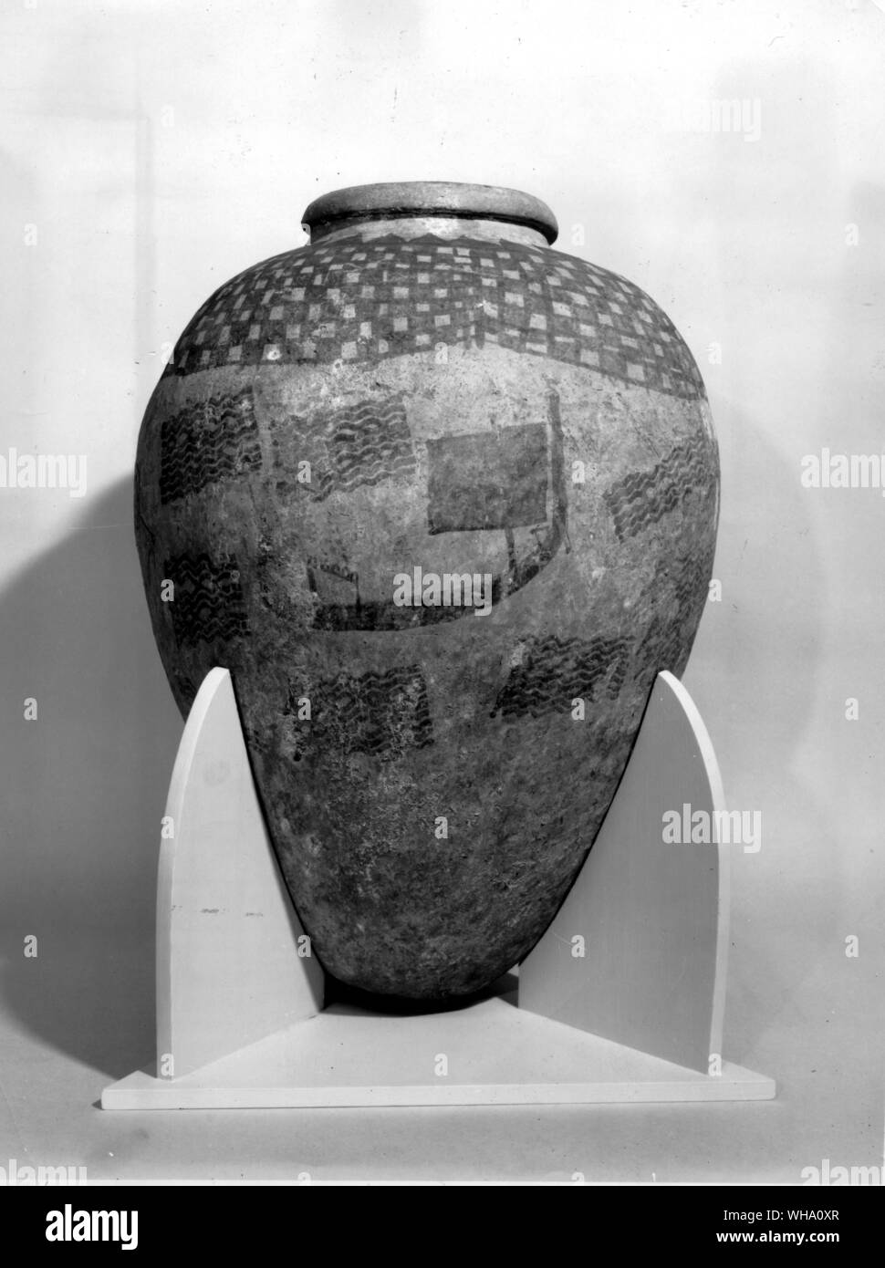 The first known representation of a square sail - At the end of the Naquada period there is one last superb pot (now in the British Museum); it carries a plain, careful picture of a ship with a square sail. One theory is that the pot depicts a foreigner - the square sail is sometimes used in heiroglyphics to denote a stranger - and that it records the advent of a visiting ship from the Persian Gulf, the end perhaps of the first foreign-going voyage. It may be so. Naquada was a small town on the bend of the Nile where the ancient track came over the mountains from Quseir by way of the Wadi Stock Photo