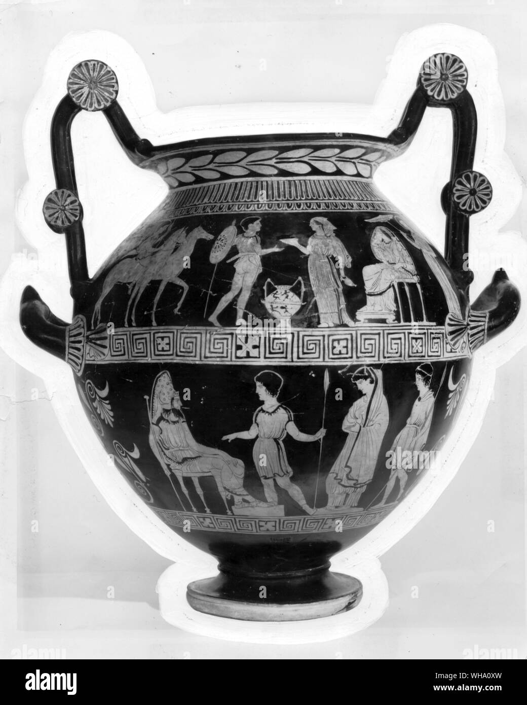 The legendary beginnings of the Trojan War, the bottom picture  on this Athenian vase shows Paris presenting Helen to his father at his court in Troy. Stock Photo