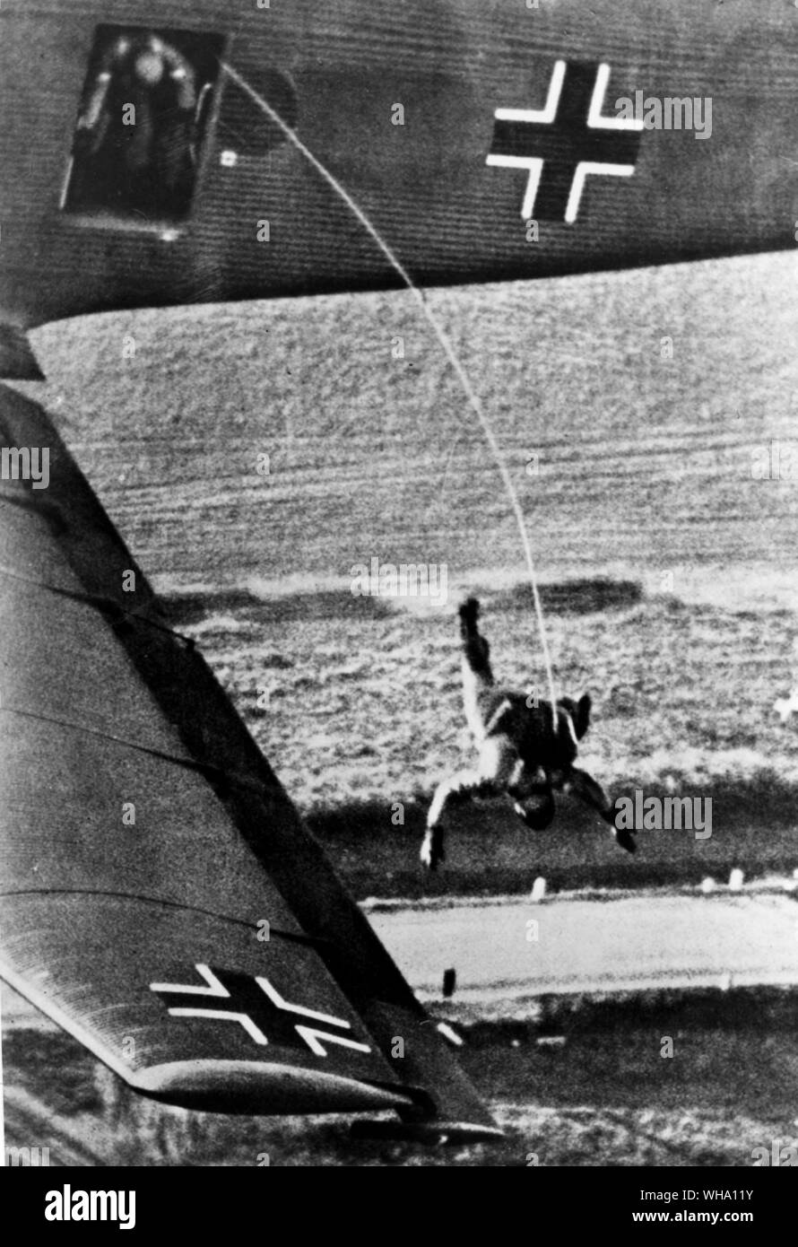 WW2: German paratrooper dropping from a plane for the attack on Holland, 10th May 1940. Stock Photo