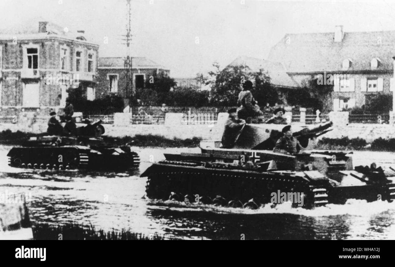 WW2: German tanks tavel through a river in Belgium. Stock Photo