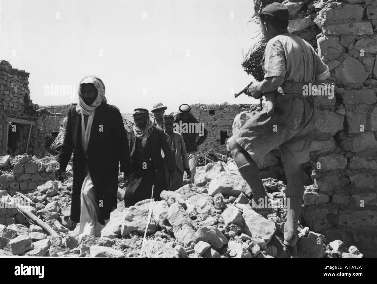 WW2: RAF rounding up Bedouin Arabs inside Port. Rutbahm Iraq. 16th May 1941. Stock Photo