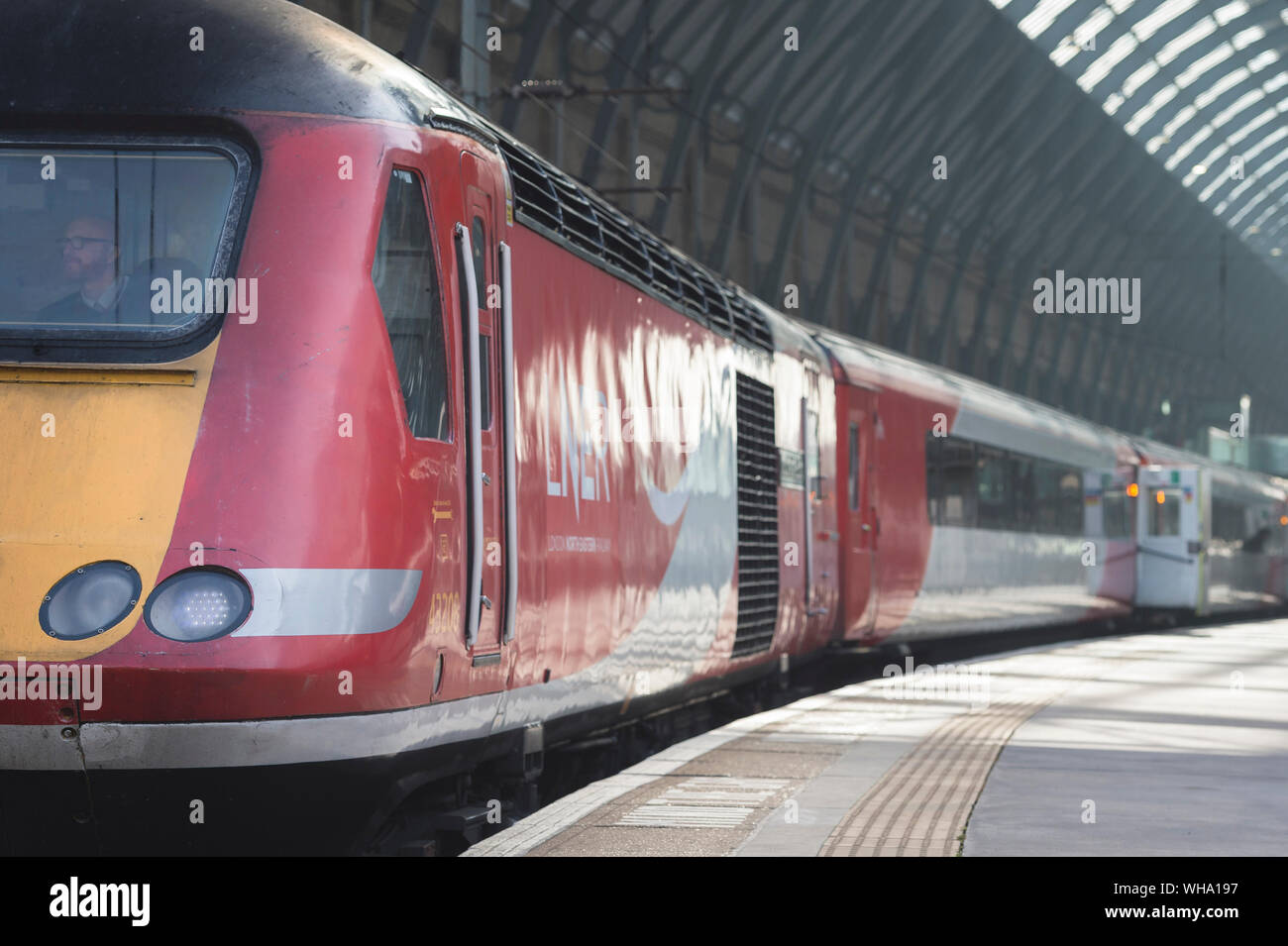 HIgh speed train in LNER livery waiting at King's Cross Railway Station, London, England. Stock Photo
