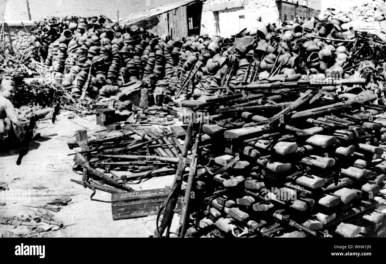 WW2: The Great Patriotic War, 1941-45. After the route of the Hitlerite forces at Kersones, near Sevastopol. Guns, ammunition and helmets piled up. 1944. Stock Photo