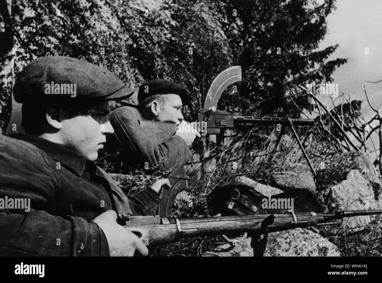 WW2: Russian partisans in ambush positions. Pskov region, 1941. The Great Patriotic War, 1941-45. Stock Photo