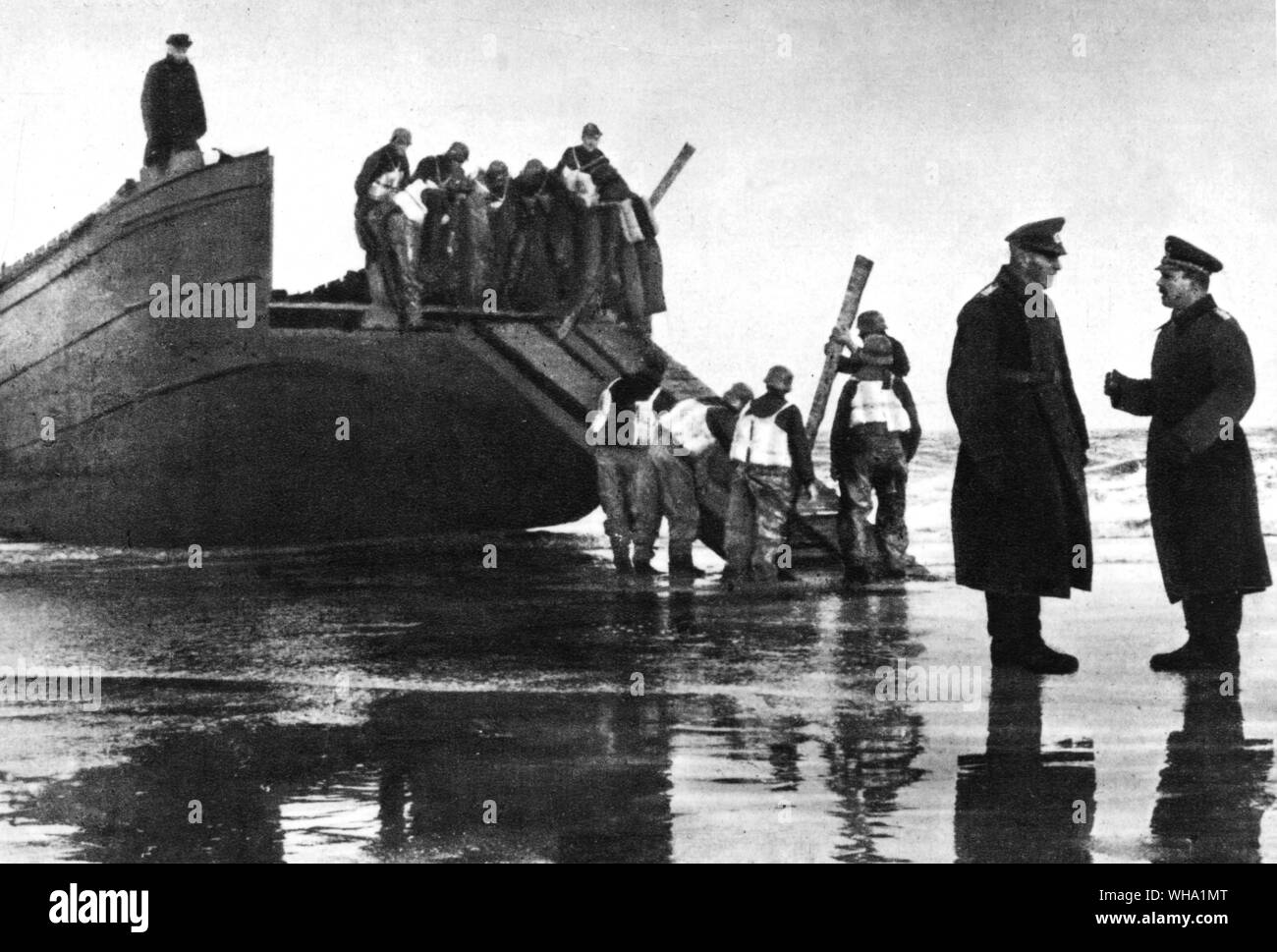 Ww2 German Troops Attachjng Ramps To Converted Barges During An