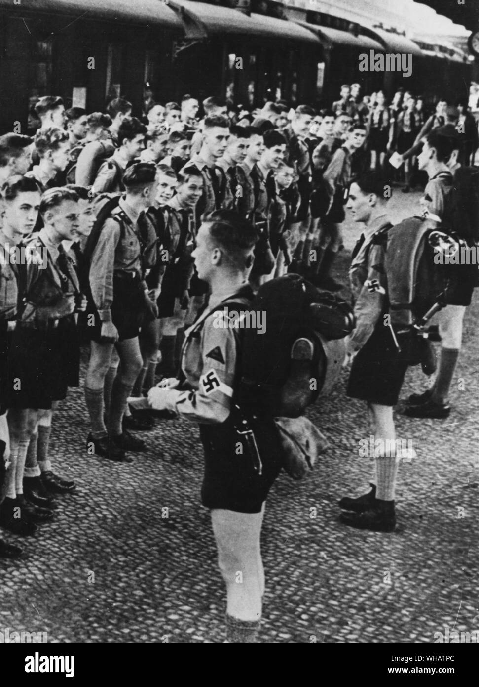 WW2: Young German boys become a part of the Nazi Party - in the Hitler Jugond (Hitler Youth), a Nazi sponsored youth scheme. Compulsory labour and military service were established after the party obtained supreme power in Germany. Stock Photo