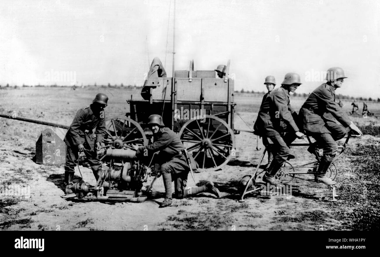 WW1: Germans generating electricity by pedal cycle for a field radio. The telephone remained the basic means of battle communication. Stock Photo