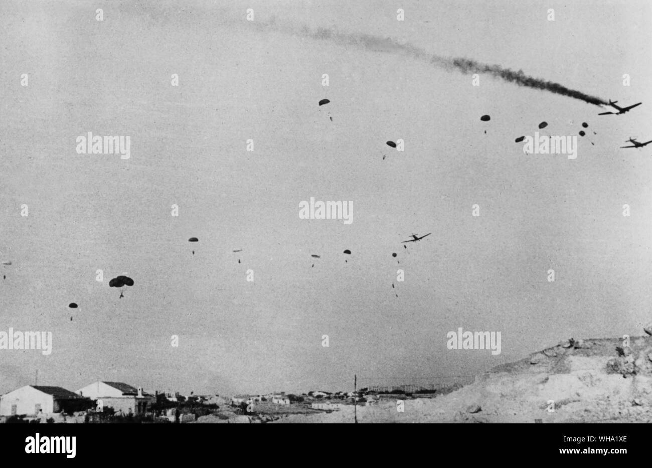 WW2: Parachute troops descending on Crete. Invasion of Crete began on 20th May 1941. Stock Photo