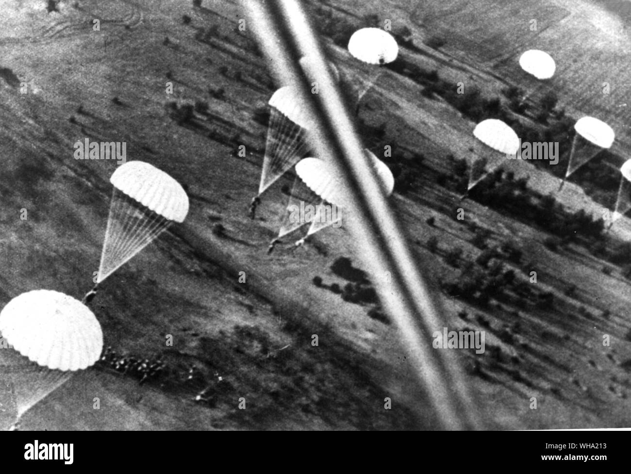 WW2: German paratroops landing near an airfield in Holland, 10th May 1940. Stock Photo