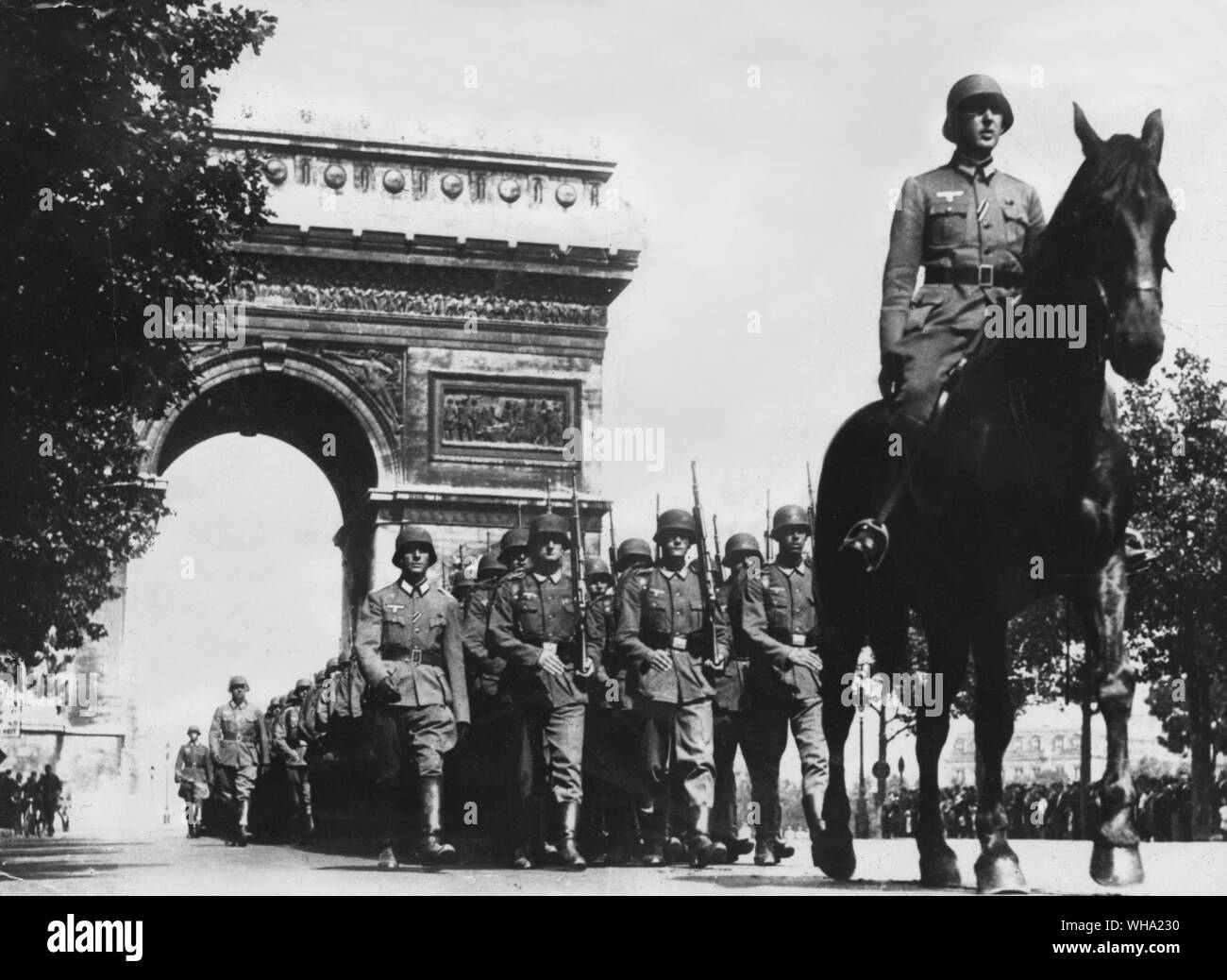 WW2: German troops march through the Champs Elysees, Paris, France. Stock Photo