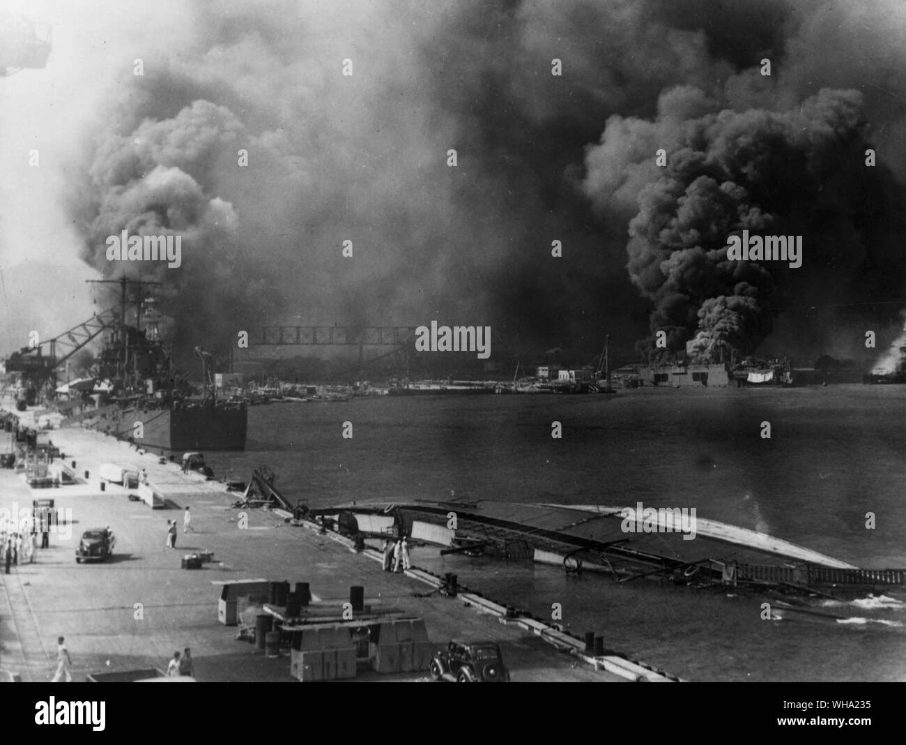 WW2: USS Helena is rendered helpless at Pearl Harbour, after being torpedoed by Japanese weapons. The ship went down on 7th June 1943. Stock Photo