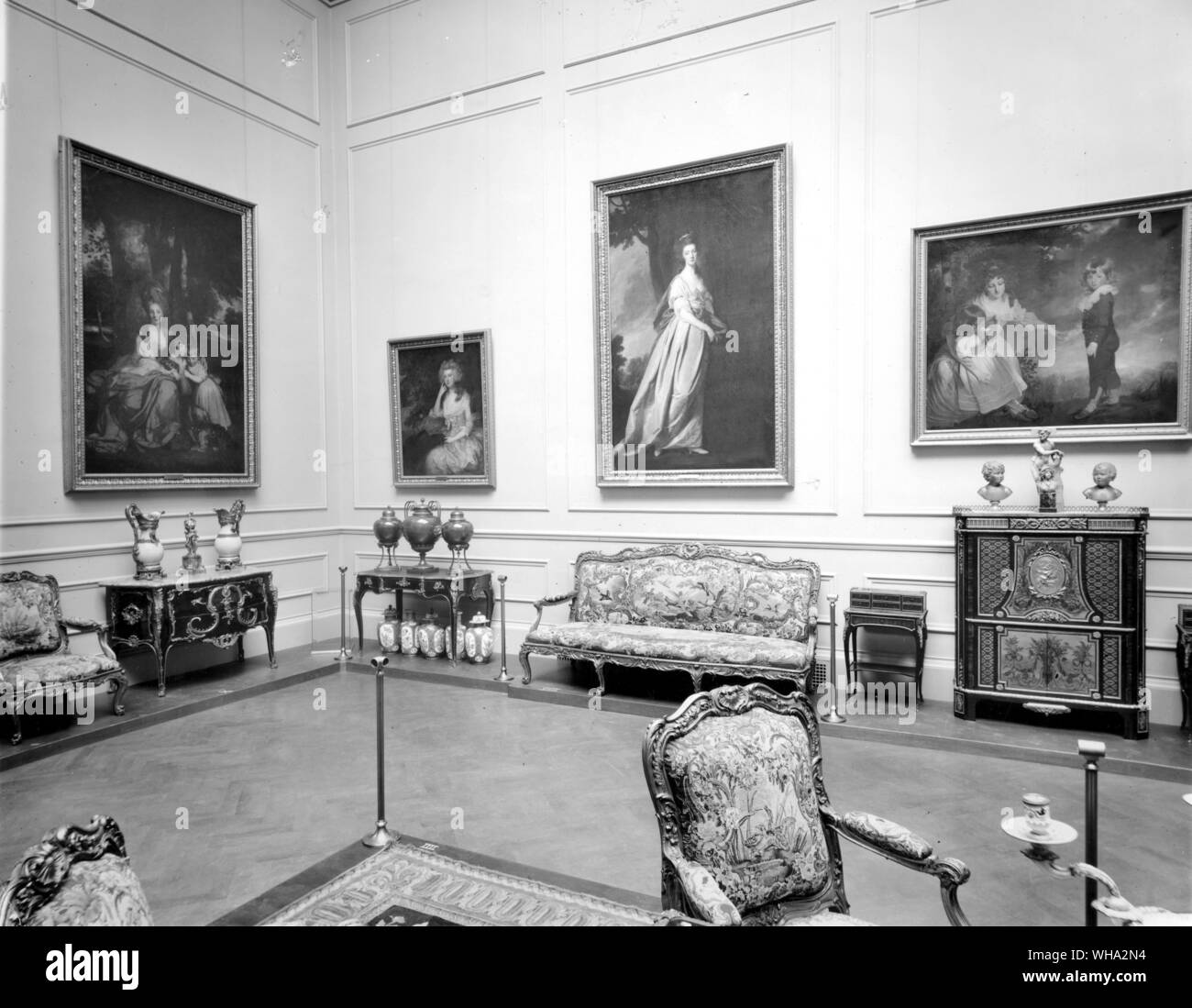 Metropolitan Mususeum of Arts, New York.. Paintings are left to right: Lady Betty Delme and her children, Mrs Tennant (by Gainsborough), Mrs Scott Jackson and The Godsall Children (called The Setting Sun by Hoppner).Three of these hung in Morgan's Princes Gate dining room. Stock Photo