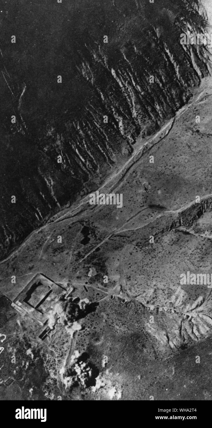 Abd El Krim had fitted up telegraph and telephone communications with his troops in the fighting lines: an air view of bombs bursting on his HQ at Alhucemas. Stock Photo