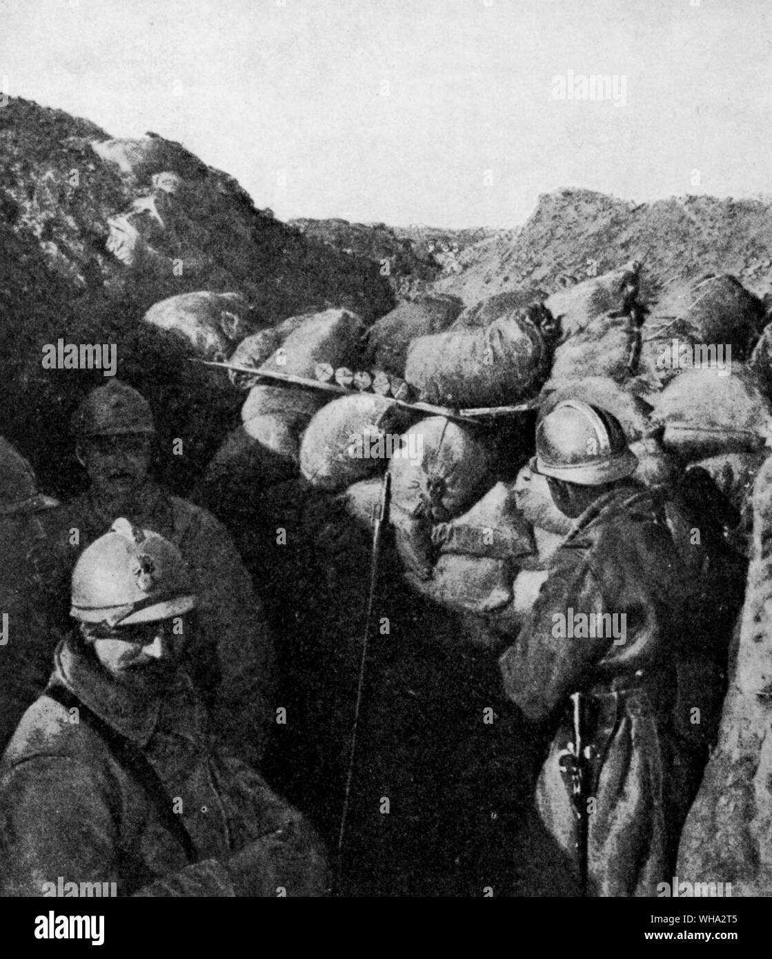 Enemies in the same trench. French soldiers in the foreground divided from the Germans in the distance only by sandbag traverses. Stock Photo