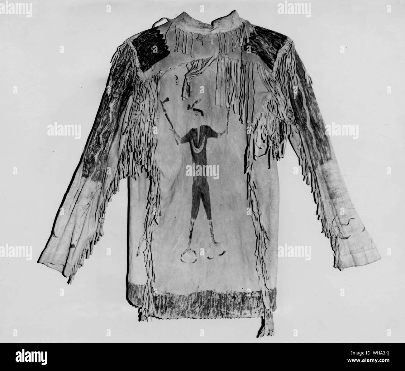 American Indian culture: Ghost Dance coat of buckskin with painted decoration. Probably of Arapaho origin. Crow, Montana. 31 inches in length. Stock Photo