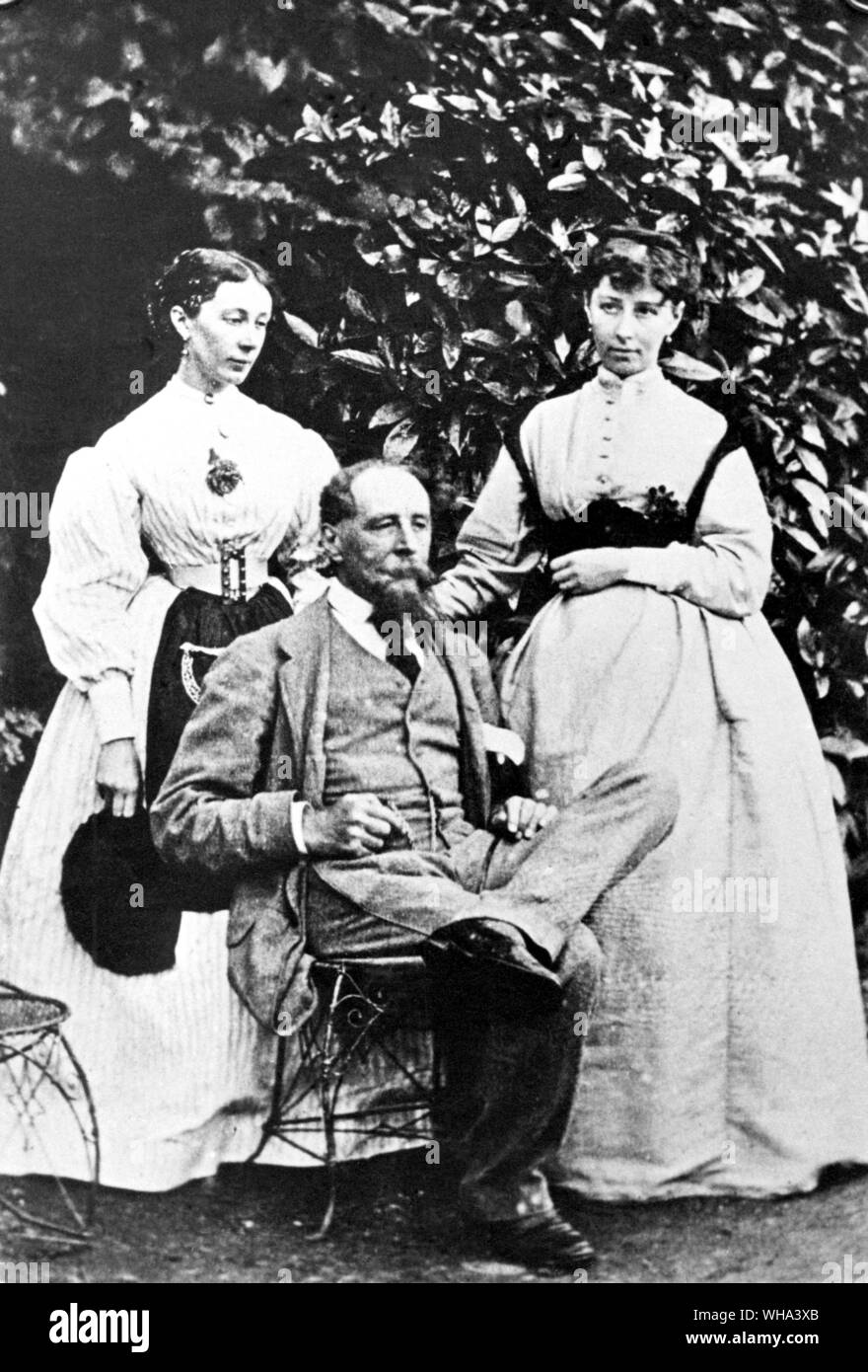Charles Dickens with his two daughters, Kate and Mamey. . Dickens, Charles John Huffam (pseudonym Boz) English novelist. wrote novels Pickwick Papers 1836-1837, Oliver Twist 1837-1839, A Christmas Carol 1843, Bleak House 1852-1853, A Tale of Two Cities 1859  1812-1870 . . Stock Photo