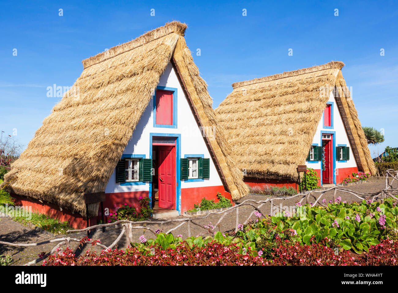 Traditional triangular thatched A-framed Palheiro Houses, Santana, Madeira, Portugal, Atlantic, Europe Stock Photo