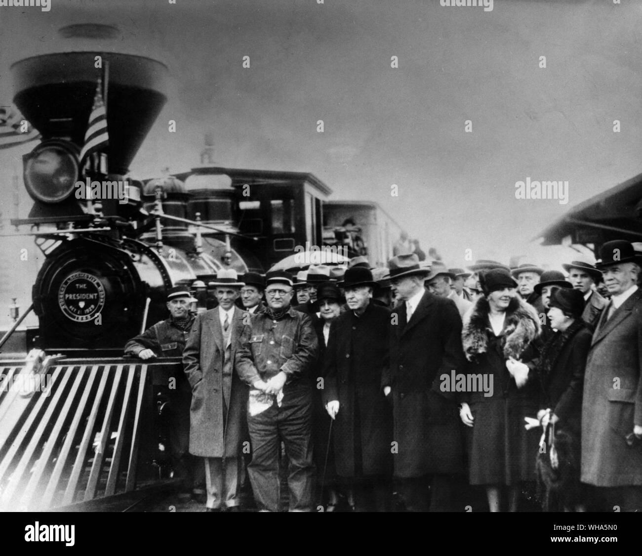 Henry Ford next to the locomotive engineer Mrs Hoover and Mrs Ford to the Presidents left.. October 21st 1929. Edison National Historic Site. Orange New Jersey Stock Photo