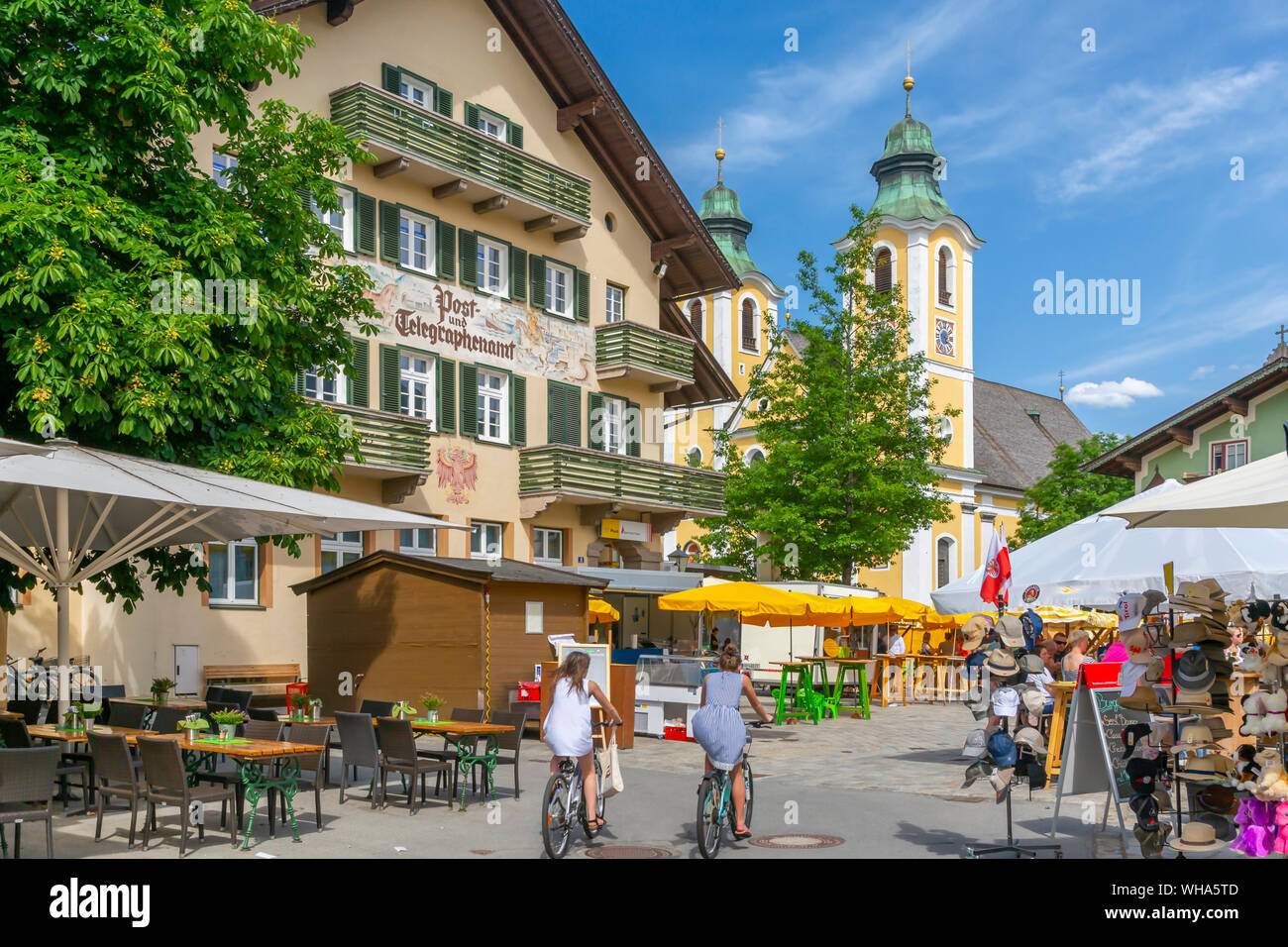 View of Church (Barocke Pfarrkirche) and market in St. Johann, Austrian Alps, Tyrol, Austria, Europe Stock Photo
