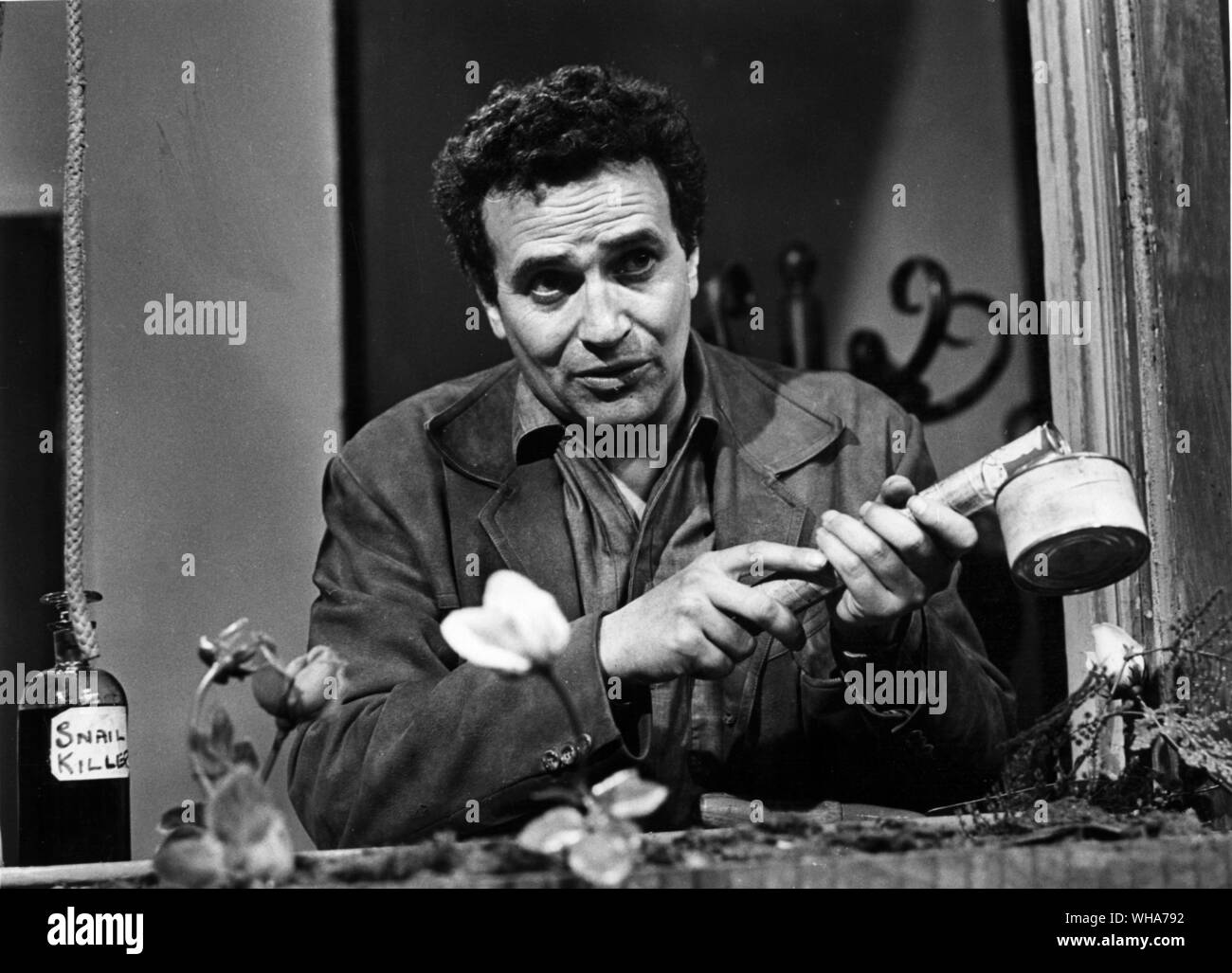 It's A Square World. Michael 'Oblong' Bentine in his window box for on of the sketches. 28th August 1960 Stock Photo