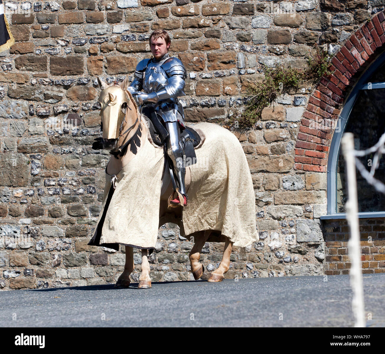 A mounted Knight in Armour preparing to  taking part in a Joust: The Battle for Good at Dover Castle Stock Photo