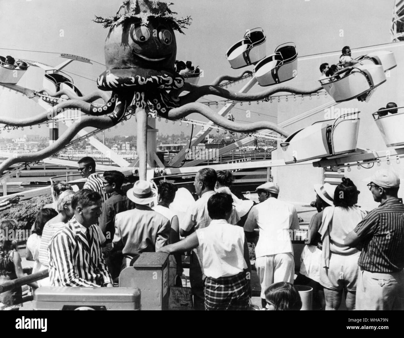Mr Octopus at the fun fair at Pacific Ocean Park California. His outstretched tentacles support rotating seats designed to give passengers the thrill of their lives. 1953 Stock Photo
