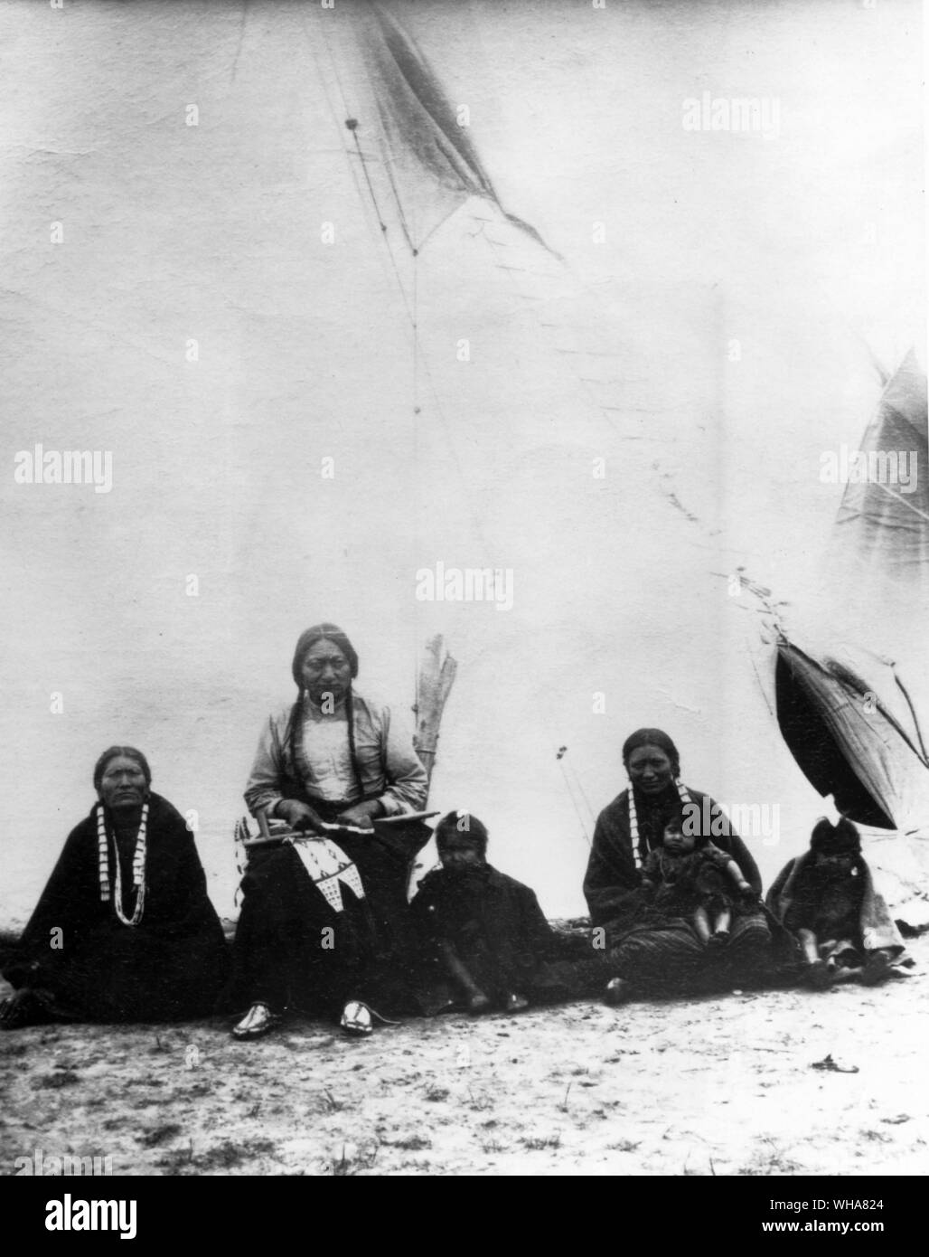 Sitting Bull with two wives and three children. Hunkpapa Sioux. Photo taken at Fort Randall . South Dakota. 1882 Stock Photo