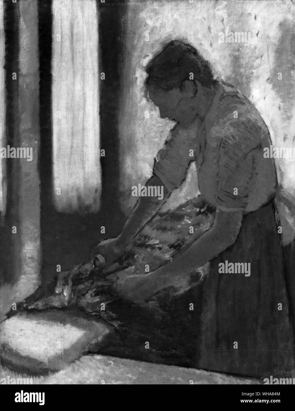 Woman Ironing . Degas Stock Photo