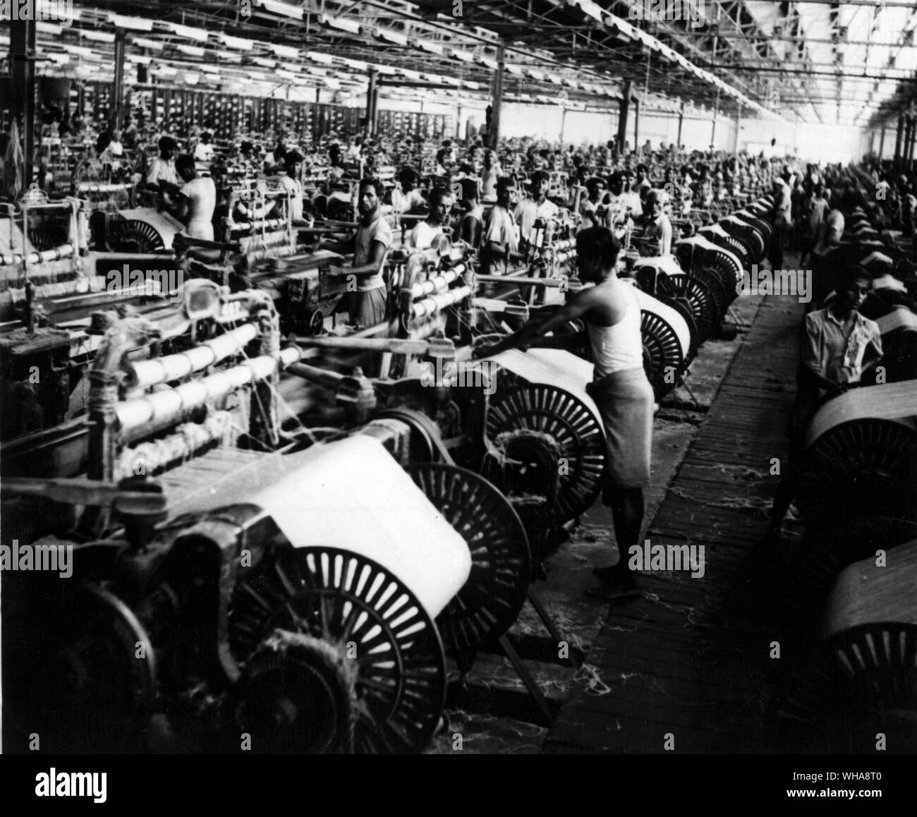 One of the weaving sections in the Adomjee Jute Mills at Narayamganj near Dacca . East Pakistan Stock Photo