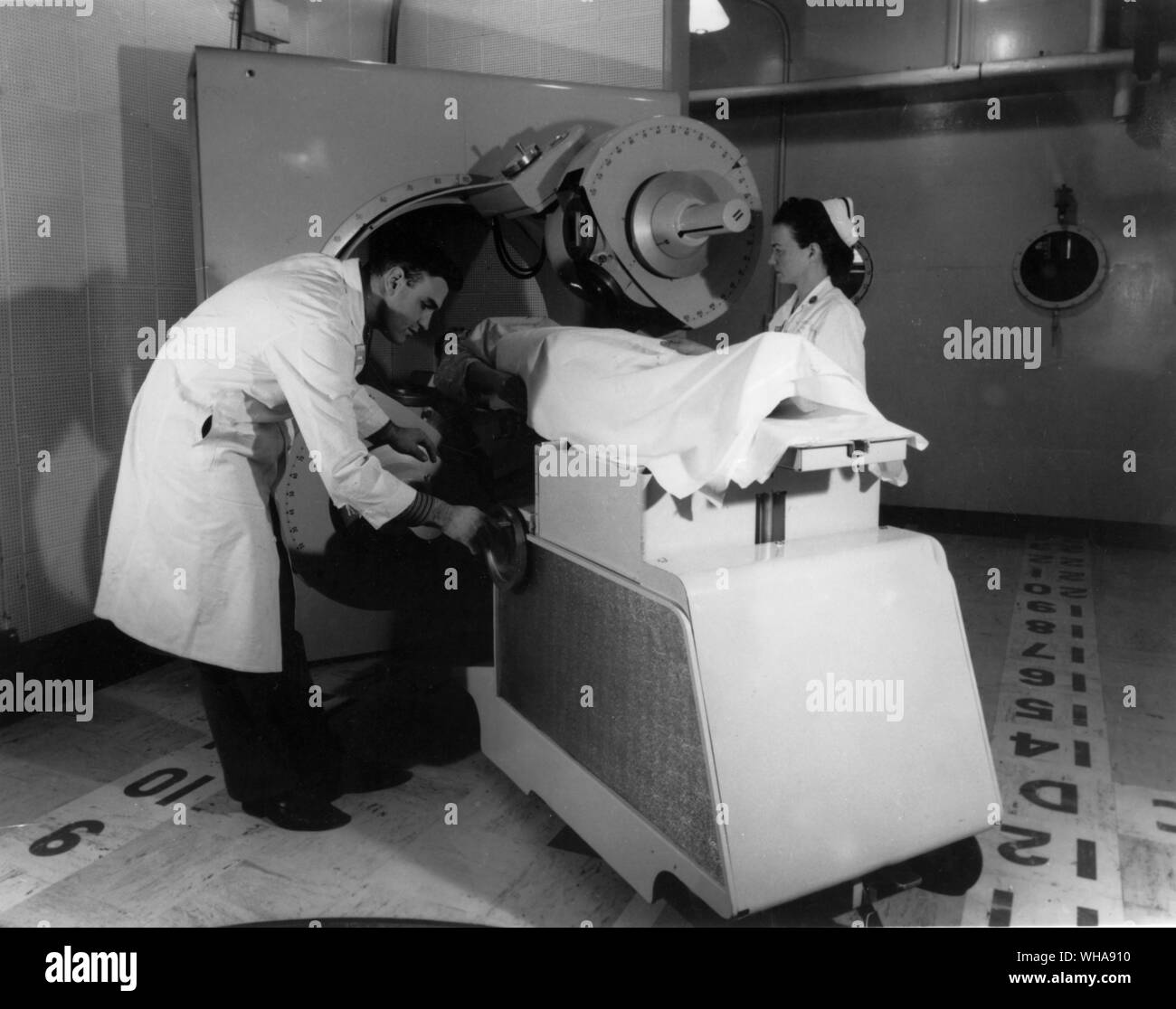 A two headed rotational teletherapy device with two cobalt 60 sources is used to treat patients at the Medical Division of the Atomic Energy Commission's Oak Ridge Associated Universities Tennessee. Stock Photo